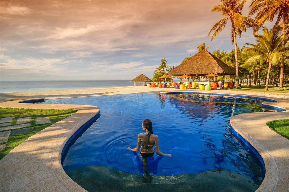 Oceanica Resort Panglao, Bohol Bagian luar foto Infinity pool at the beach