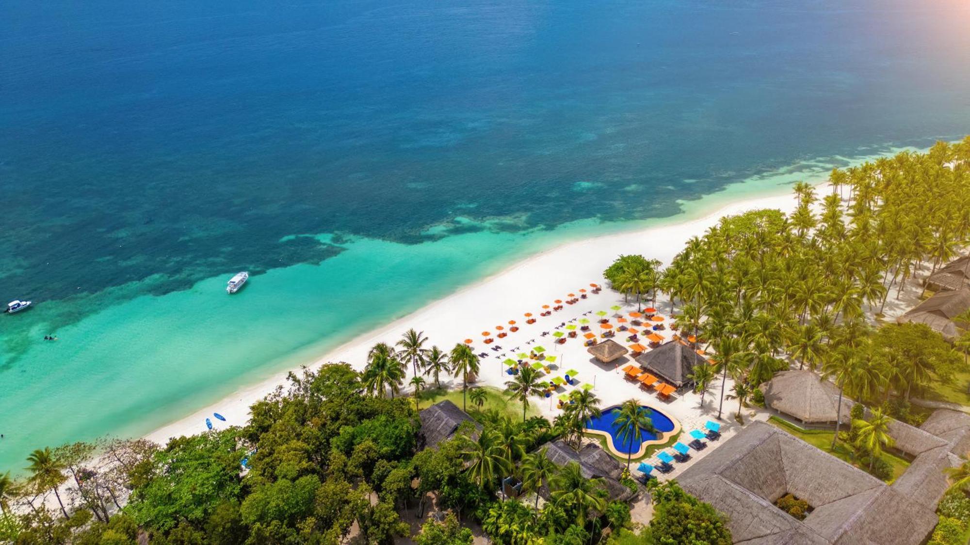 Oceanica Resort Panglao, Bohol Bagian luar foto Aerial view of the beach