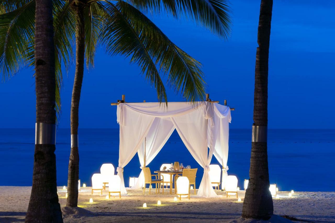Oceanica Resort Panglao, Bohol Bagian luar foto A beachside dining experience at the resort