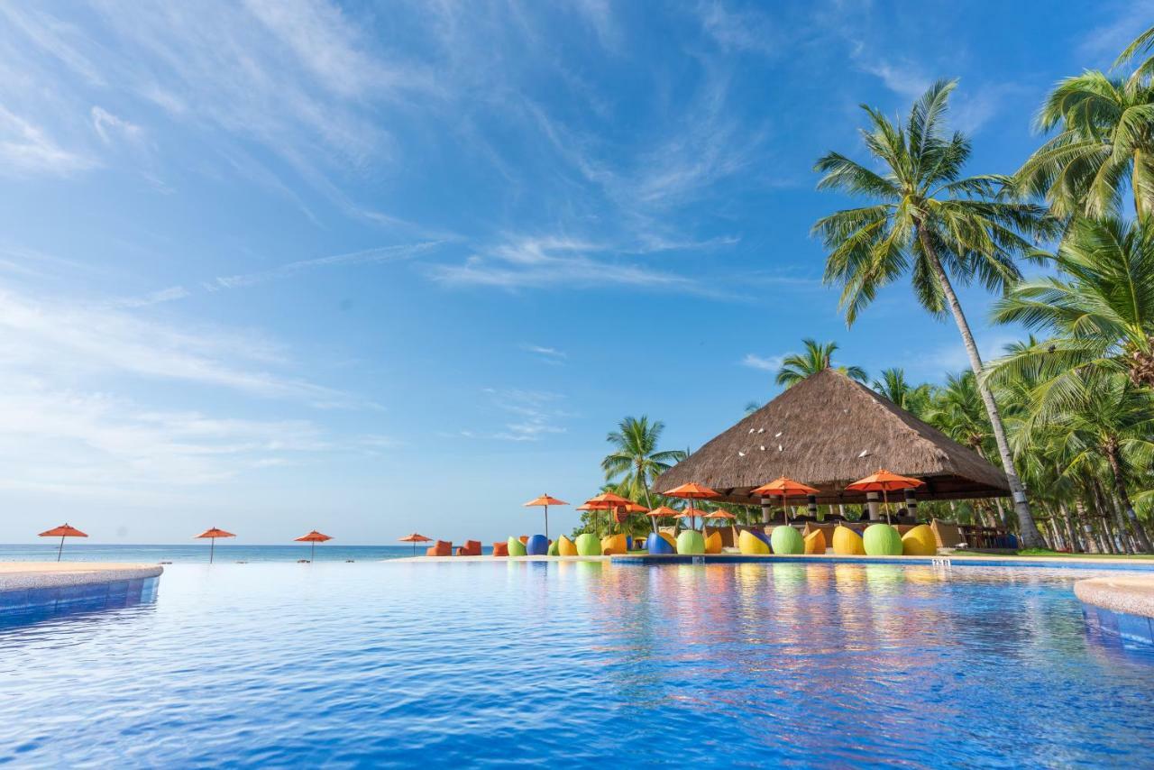 Oceanica Resort Panglao, Bohol Bagian luar foto The beach at the resort