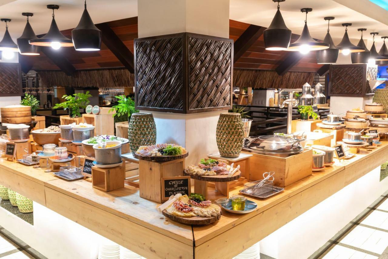 Oceanica Resort Panglao, Bohol Bagian luar foto A buffet at a hotel